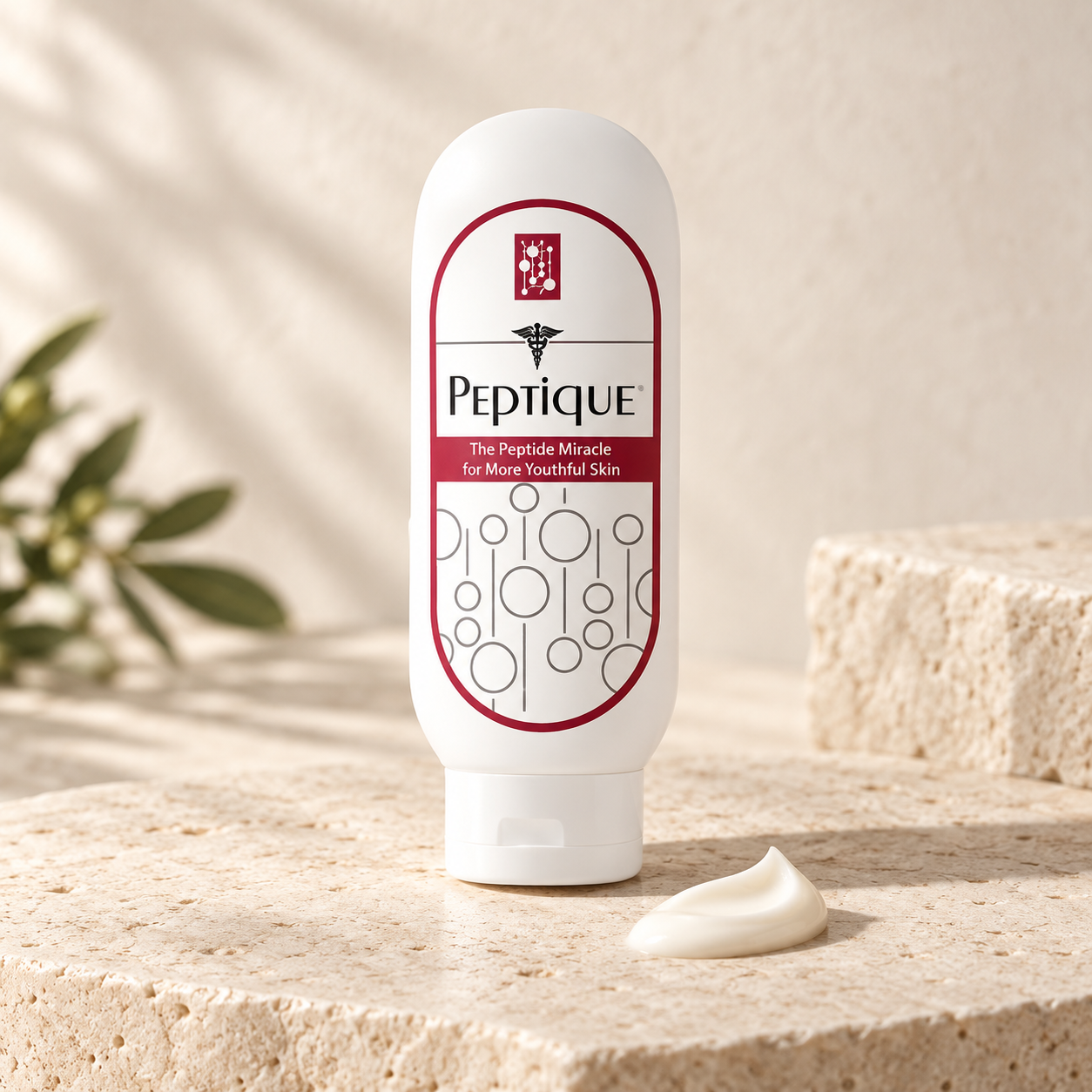 Peptique moisturizer on warm ivory stone